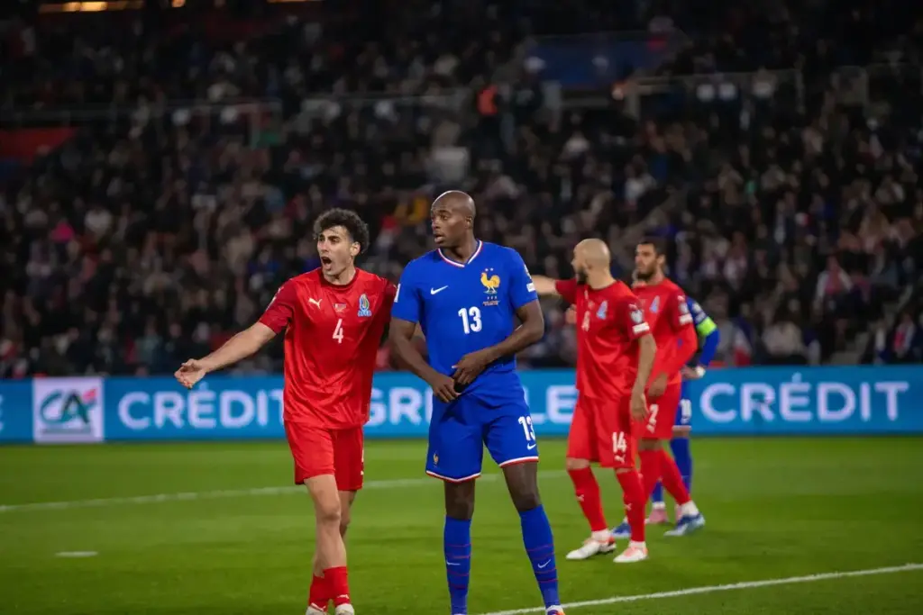 Maxence Lacroix and Jean-Philippe Mateta in France World Cup semi-final action