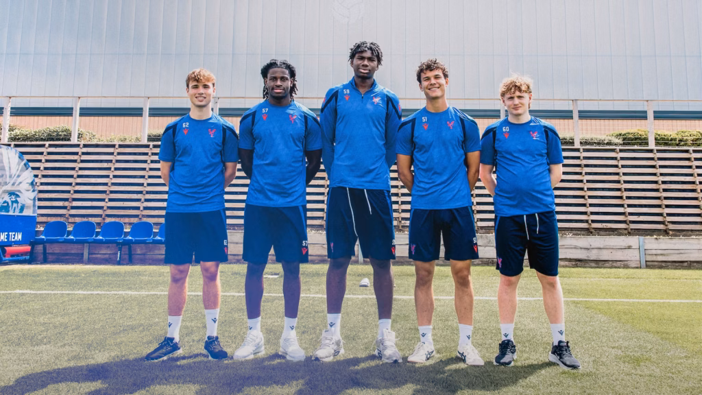 Crystal Palace academy players celebrating their first professional contracts